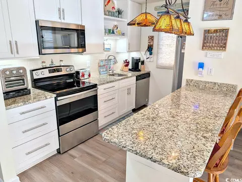 Kitchen - 207 Double Eagle Dr #A-1, Surfside Beach, SC 29575 photo 4 of 5