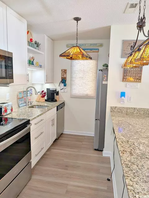 Kitchen - 207 Double Eagle Dr #A-1, Surfside Beach, SC 29575 photo 1 of 5