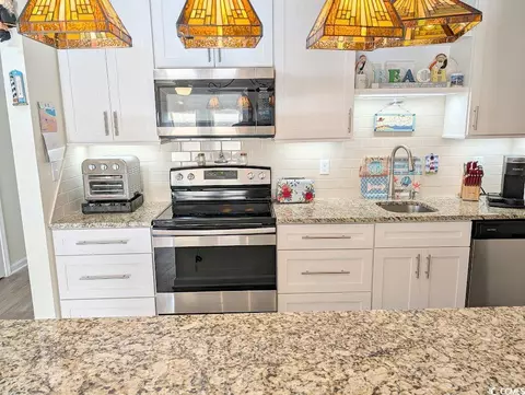 Kitchen - 207 Double Eagle Dr #A-1, Surfside Beach, SC 29575 photo 5 of 5