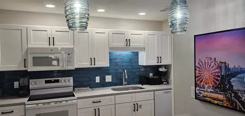 Kitchen - 218 Double Eagle Dr, Surfside Beach, SC 29575 photo 2 of 4