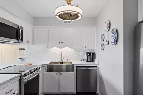 Kitchen - 416 Ocean Blvd N #E19, Surfside Beach, SC 29575 photo 4 of 6