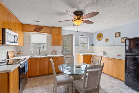 Kitchen - 310 14th Ave S, Surfside Beach, SC 29575 photo 2 of 2