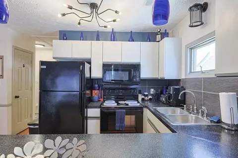 Kitchen - 900 Deer Creek Rd #E, Surfside Beach, SC 29575 photo 4 of 4