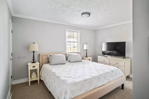 Bedroom - 328 16th Ave S, Surfside Beach, SC 29575 photo 3 of 4