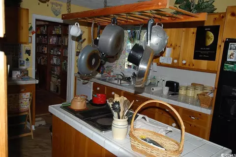 Kitchen - 1014 S Cedar Dr, Surfside Beach, SC 29575 photo 1 of 3