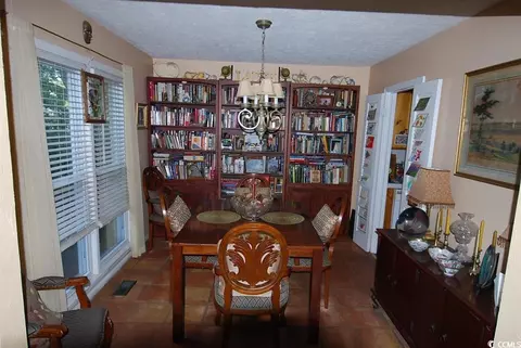 Dining - 1014 S Cedar Dr, Surfside Beach, SC 29575 photo 1 of 2