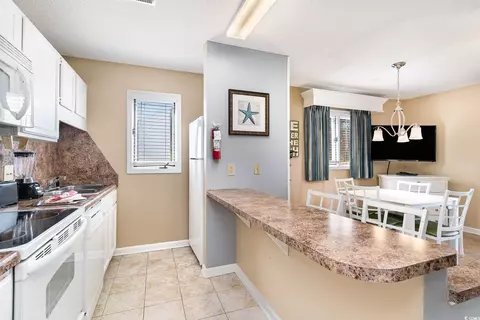 Kitchen - 206 Double Eagle Dr #H 1, Surfside Beach, SC 29575 photo 4 of 6