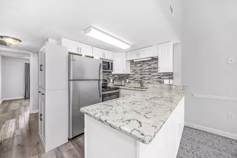Kitchen - 1600 Deer Creek Rd #E, Surfside Beach, SC 29575 photo 3 of 5