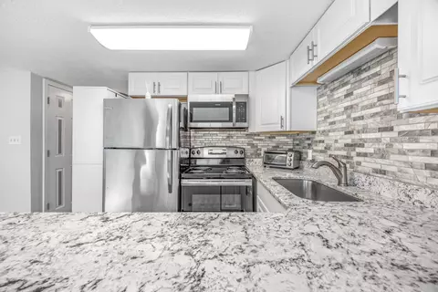 Kitchen - 1600 Deer Creek Rd #E, Surfside Beach, SC 29575 photo 5 of 5