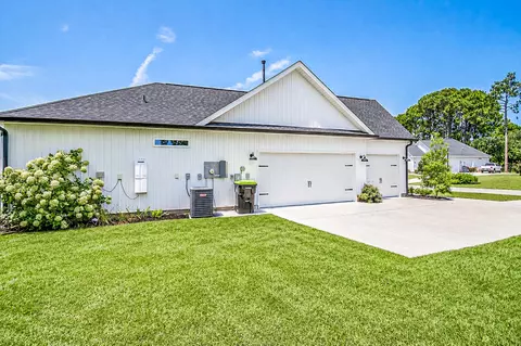 Exterior - 669 Pacific Commons Dr, Surfside Beach, SC 29575 photo 2 of 10