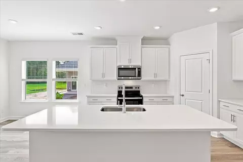 Kitchen - 412 Congaree St, Longs, SC 29568 photo 3 of 10