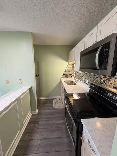 Kitchen - 204 Double Eagle Dr #C2, Surfside Beach, SC 29575 photo 2 of 3