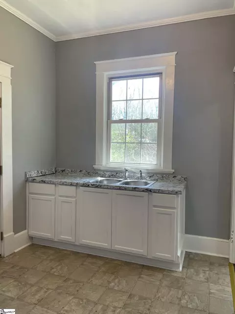 Kitchen - 100 Cedar St, Laurens, SC 29360 photo 1 of 2