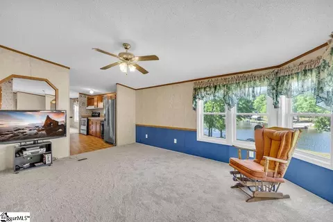 Living - 90 E Stagecoach Rd, Cross Hill, SC 29332 photo 7 of 8