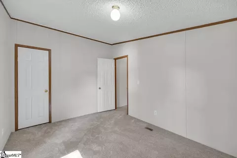 Bedroom - 90 E Stagecoach Rd, Cross Hill, SC 29332 photo 6 of 8