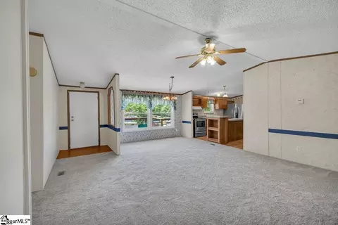 Living - 90 E Stagecoach Rd, Cross Hill, SC 29332 photo 3 of 8