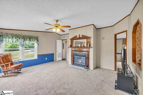 Living - 90 E Stagecoach Rd, Cross Hill, SC 29332 photo 6 of 8