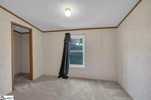Bedroom - 90 E Stagecoach Rd, Cross Hill, SC 29332 photo 3 of 8