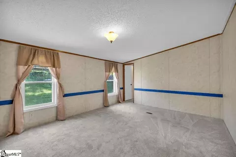 Bedroom - 90 E Stagecoach Rd, Cross Hill, SC 29332 photo 7 of 8