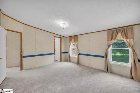 Bedroom - 90 E Stagecoach Rd, Cross Hill, SC 29332 photo 8 of 8