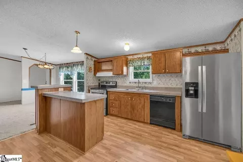 Kitchen - 90 E Stagecoach Rd, Cross Hill, SC 29332 photo 2 of 2