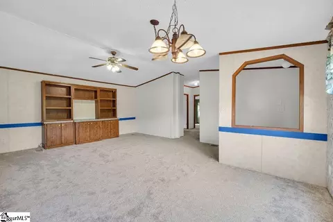 Living - 90 E Stagecoach Rd, Cross Hill, SC 29332 photo 5 of 8