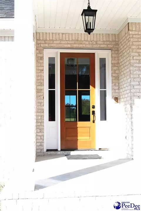 Exterior - 5820 Clearbrook Rd, Effingham, SC 29541 photo 3 of 8