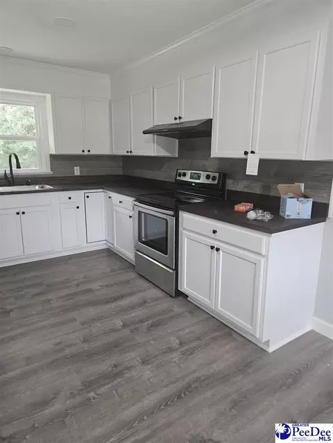 Kitchen - 314 E Country Club Dr, Dillon, SC 29536 photo 2 of 2