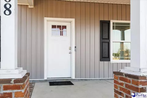 Exterior - 908 E Candy Ln, Florence, SC 29505 photo 3 of 6