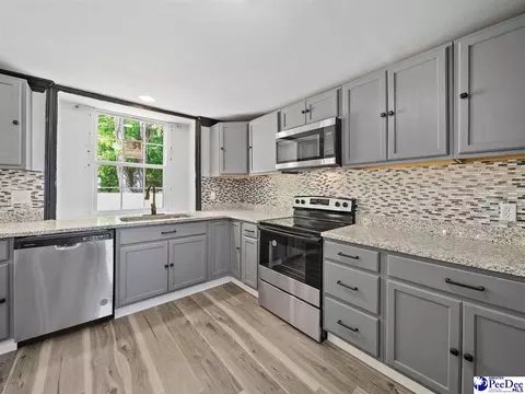 Kitchen - 308 E Miller, Jefferson, SC 29718 photo 5 of 6