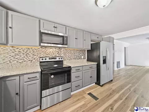 Kitchen - 308 E Miller, Jefferson, SC 29718 photo 4 of 6