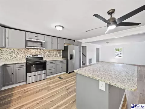 Kitchen - 308 E Miller, Jefferson, SC 29718 photo 3 of 6