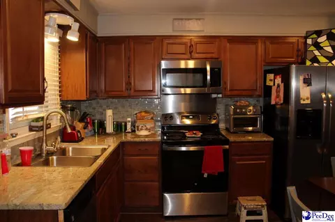 Kitchen - 1407 Aaron Cir, Florence, SC 29506 photo 2 of 2