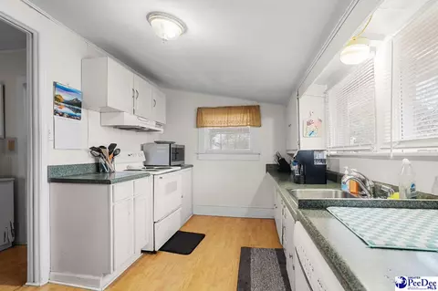 Kitchen - 151 E Pine Ave, Mcbee, SC 29101 photo 2 of 2