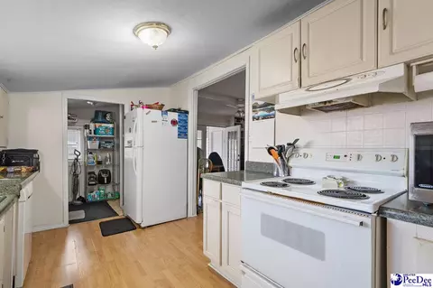 Kitchen - 151 E Pine Ave, Mcbee, SC 29101 photo 1 of 2