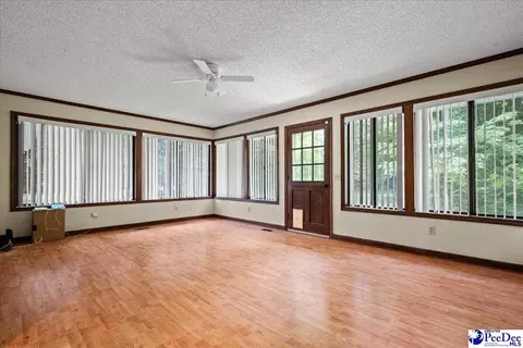 Living - 1403 Pheasant Rd, Effingham, SC 29541 photo 4 of 5