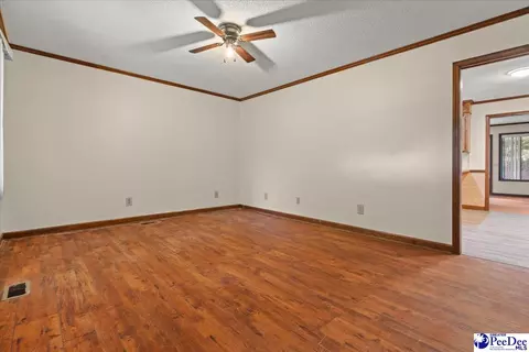Living - 1403 Pheasant Rd, Effingham, SC 29541 photo 1 of 5