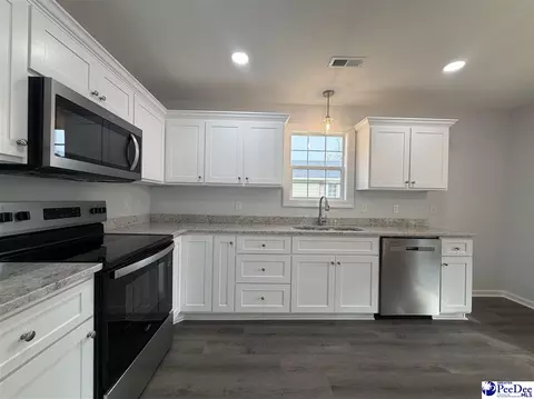 Kitchen - 519 E Main St, Latta, SC 29565 photo 2 of 3