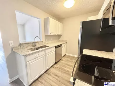Kitchen - 527 Third Loop Rd UNIT F, Florence, SC 29505 photo 3 of 4