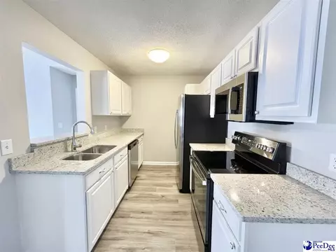 Kitchen - 527 Third Loop Rd UNIT F, Florence, SC 29505 photo 2 of 4