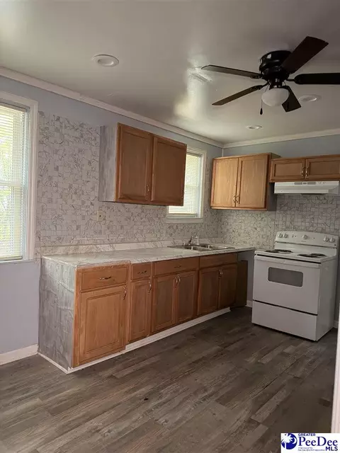 Kitchen - 701 S 5th Ave, Dillon, SC 29536 photo 3 of 4