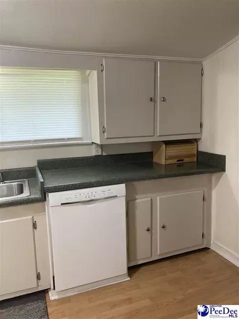 Kitchen - 151 E Pine Ave, Mcbee, SC 29101 photo 5 of 6