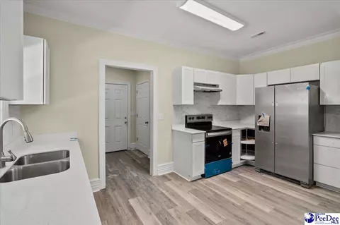 Kitchen - 609 E Pine St, Florence, SC 29506 photo 3 of 4