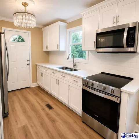 Kitchen - 700 E Candy Ln, Florence, SC 29505 photo 4 of 4