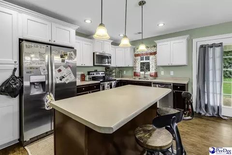 Kitchen - 334 S 9th St, Mcbee, SC 29101 photo 3 of 3