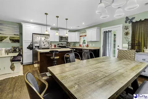 Kitchen - 334 S 9th St, Mcbee, SC 29101 photo 2 of 3