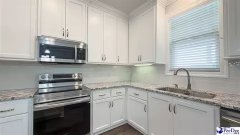 Kitchen - 1119 Mclaughlin Rd, Effingham, SC 29541 photo 3 of 3