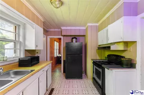 Kitchen - 411 E Leitner St, Latta, SC 29565 photo 2 of 4