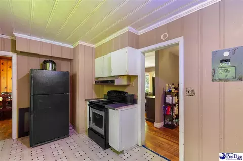 Kitchen - 411 E Leitner St, Latta, SC 29565 photo 3 of 4