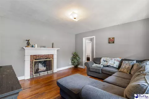 Living - 411 E Leitner St, Latta, SC 29565 photo 1 of 3